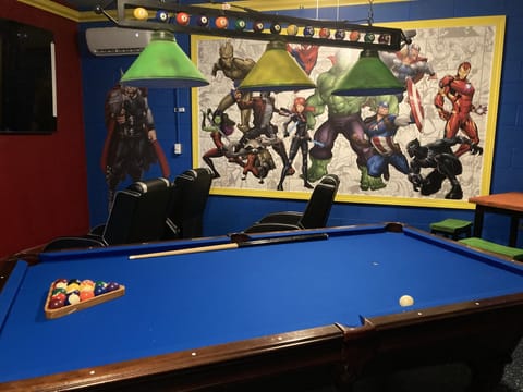 Enjoy our new Marvel theatre room with 86 inch HD TV, pool table, and more.
