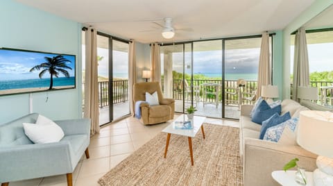 Beautiful direct oceanfront corner unit at Cape Winds, featuring a cozy living area with stunning views.
\