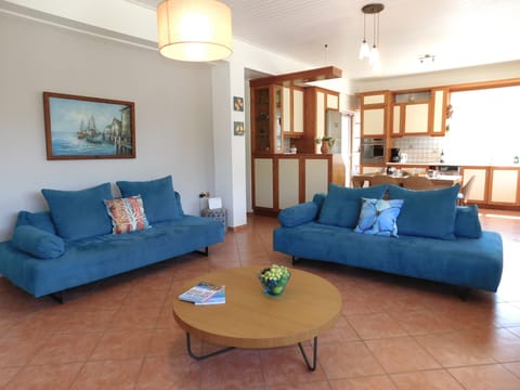 Villa Almarine upstairs open-plan living room and kitchen.