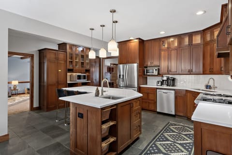 Huge kitchen with 2 sinks and plenty of counter space for cooking/serving for large groups!