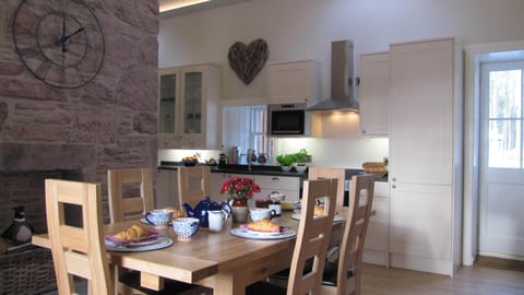 The very Spacious and Light Dining Area with super well-equipped Stylish Kitchen