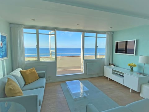 Doors open onto gorgeous private sun terrace with stunning panoramic sea views