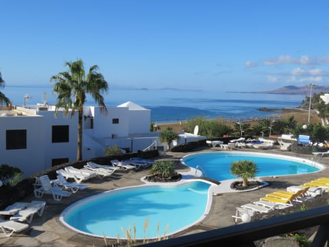 View from the balcony, 180 degree pool, sea, beach and mountain views!