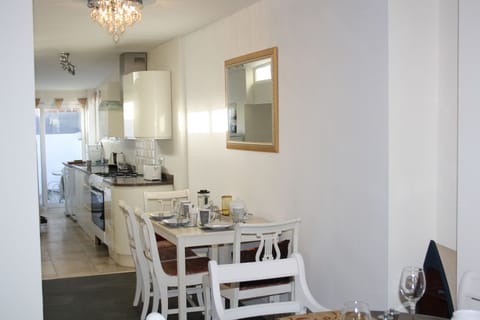 Breakfast table and kitchen