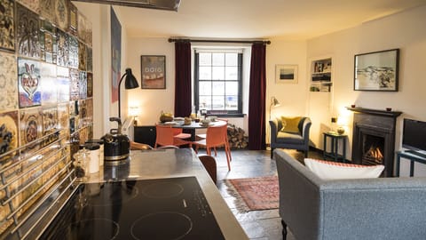The open plan sitting room and kitchen.