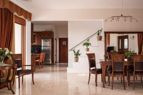 The main living room area with direct access to a spacious sea view veranda!