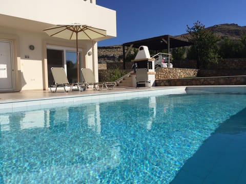 Tranquil pool and view of mountain to rear