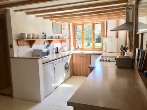 DH main kitchen white goods with 2 fridges and box freezer