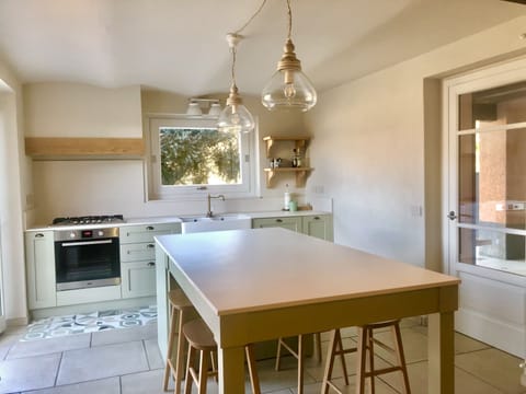 Lake view kitchen between porch and terrace
