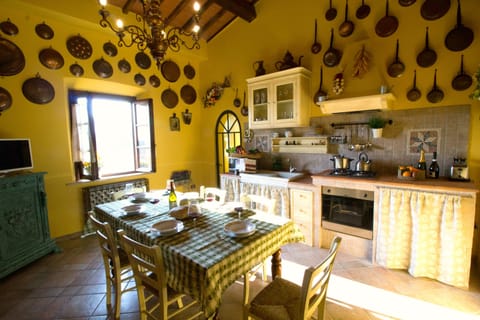 Stone kitchen with colecctions of authentic coopper cooking pots