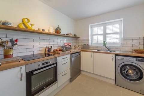 Ground floor: Kitchen with window to the front