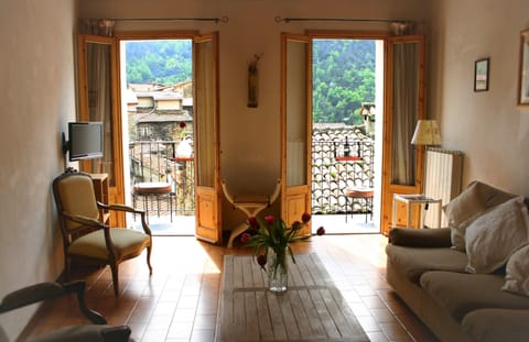 Sunny living room with stunning mountain views