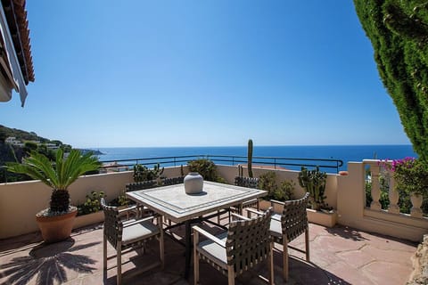 Terrace view over Cap Ferrat and the lighthouse