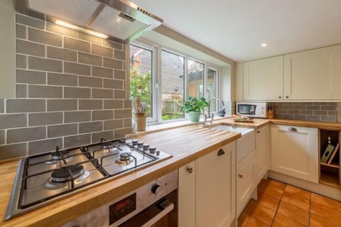 Ground floor: The well-equipped kitchen has gas hobs and electric cooker