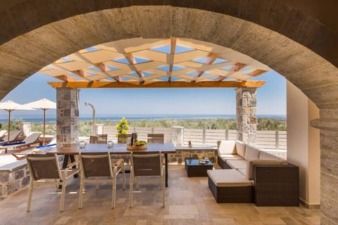 Enjoy breakfast, lunch, or dinner in this inviting outdoor dining area.