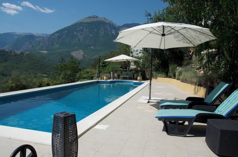 Poolside loungers and seating areas to relax upon.