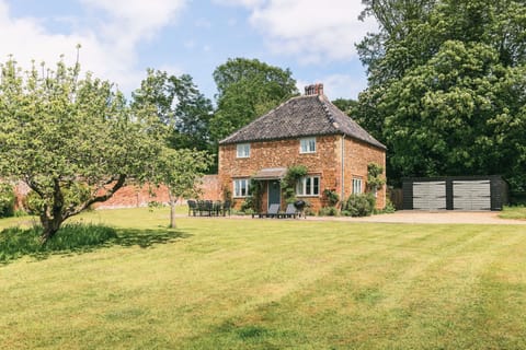 Park Cottage - Fring Estate: Front elevation and garden