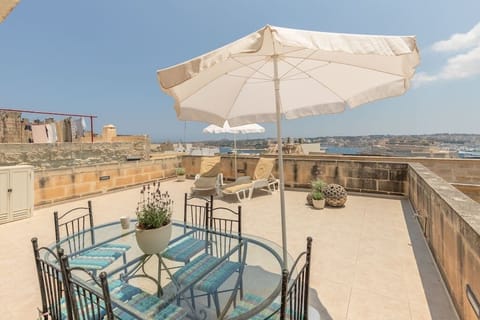Your private terrace with unique views of Grand Harbour and Fort Saint Angelo