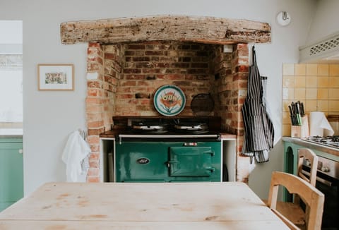 The Gate House, Wimborne: The kitchen with a teal Aga