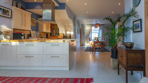 looking through massive kitchen diner perfect for entertaining with 2 ovens!