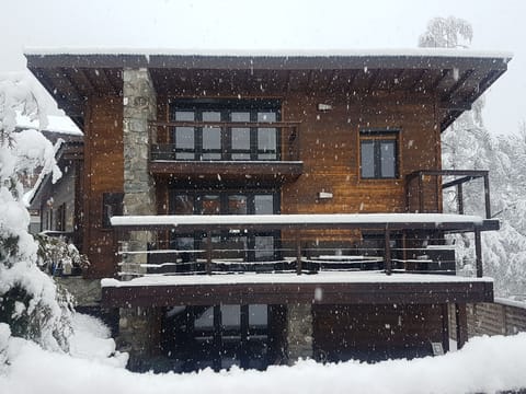 Five bedrooms, four bathrooms, with a hot-tub under the main balcony.