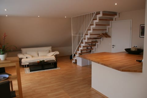 Duplex | Living area | Flat-screen TV