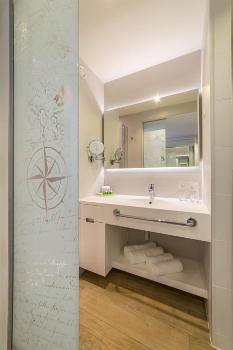 Shower, free toiletries, hair dryer, bathrobes