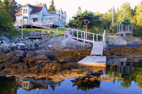 We sit on a pretty, secluded cove. Accessible by car. Dock may not be available.