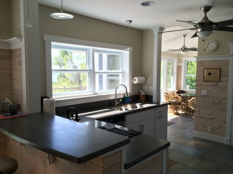 Kitchen looking into sunroom
