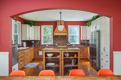 Open kitchen has plenty of counter space, great for preparing large family meals
