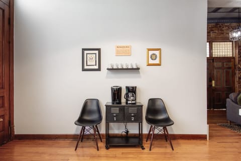 Coffee station with Keurig, coffee maker, and french press at the Bank Haus.