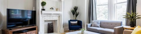 We are Superhost since 2015, over 3500 great reviews ! We have all the city permits and insurance required.  * 100% LEGAL * This is the lovely living room with a 55" Smart Roku HD TV.  Contact us! Contactez-nous!