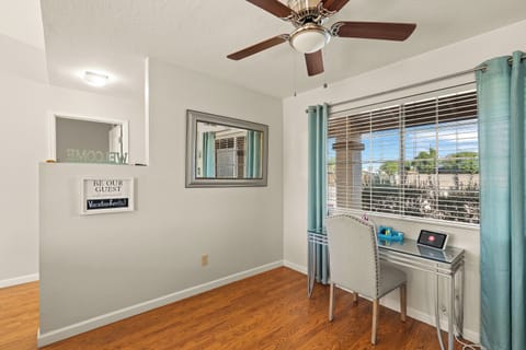 Desk just off the kitchen with a view to the front yard 