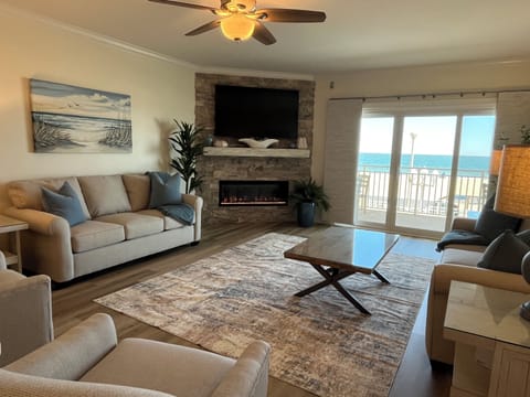 Contemporary Living room w/gas fireplace overlooking boardwalk & beach