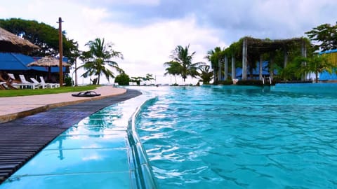 3 outdoor pools, open 7:00 AM to 10:00 PM, pool umbrellas, sun loungers
