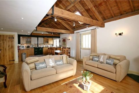 Lounge with log burner and 43” TV