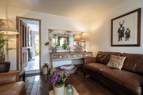 We have two vintage sofas that comfortably seat six people 