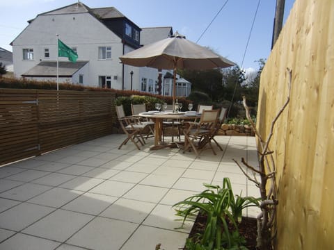 Patio area with seating for 8 people