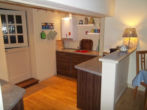 View of kitchen from hall