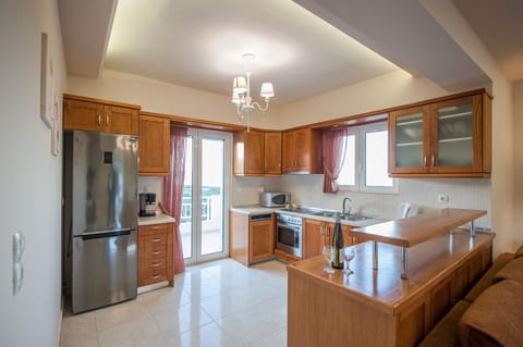 Fully equipped kitchen  for your self-catering holiday with balcony access!