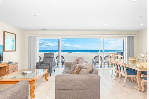 Sliding glass doors open to let in the gentle ocean breezes. Due to the moderate climate, this home, like most in the area, does not include central air.
                