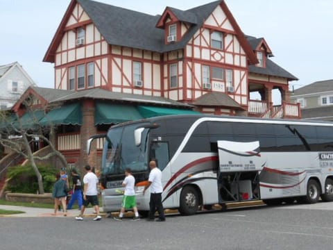 Bring a bus or there is there is free parking for 5-6 cars