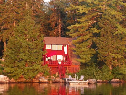 Our camp in the morning light.The water is deep and clear right up to the shore!