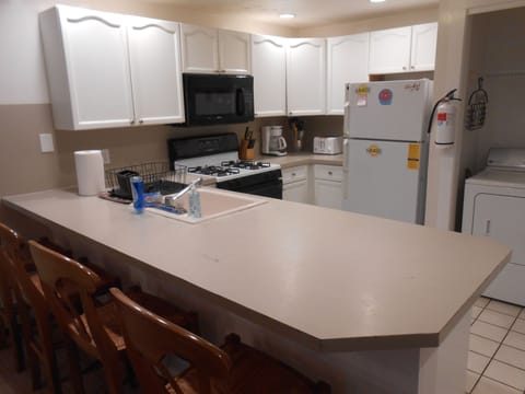 Ground Floor Condo Kitchen, counter seating, Gas Stove, Gas Washer/Dryer