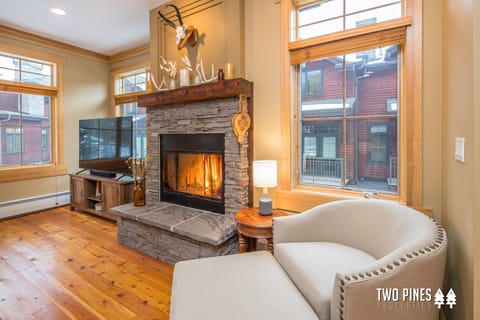 Wood burning fire place. Wood stocked in garage
