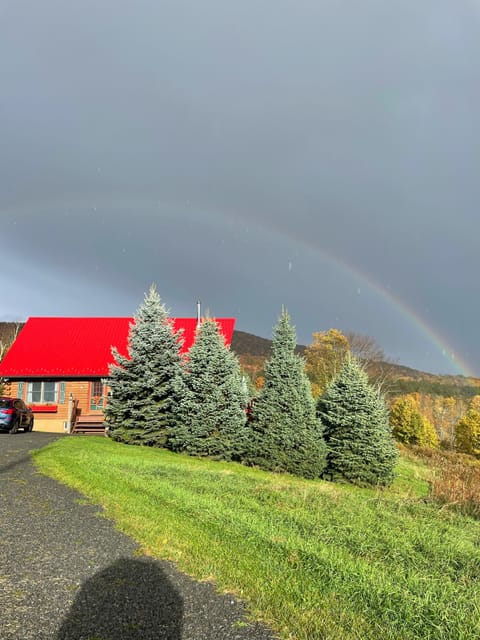 Rainbow over cabin