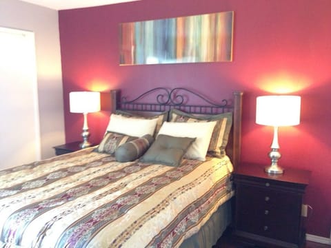 Bedroom with queen-size bed.
