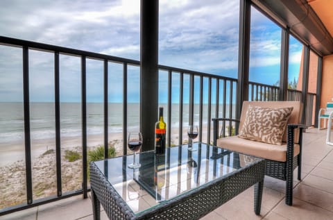 enjoying a glass a wine at sunset