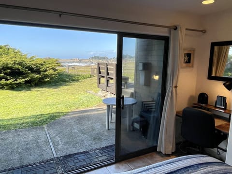 View from BEDROOM 1, KING BED + DESK. Open slider and take path to bluff trail