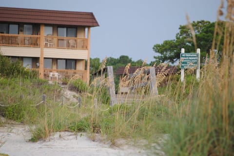 Looking back at our condo (corner right, 2nd floor) from the beach.